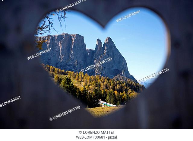 Italy, South Tyrol, Seiser Alm, Schlern in autumn, framed in a hearth