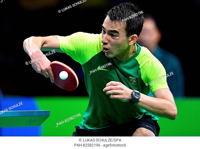 Hugo Calderano of Brazil in action against Tang of Hong Kong during the Men's Singles Round 3 match of the Table Tennis event of the Rio 2016 Olympic Games at...
