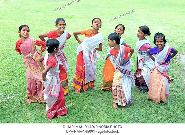 Girls performing dance and celebrating Bihu festival (new year celebration) Assam ; India NO MR