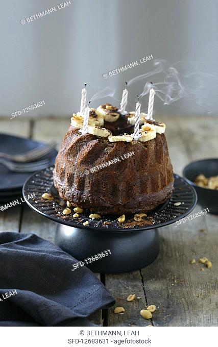Banana cake with blown out candles
