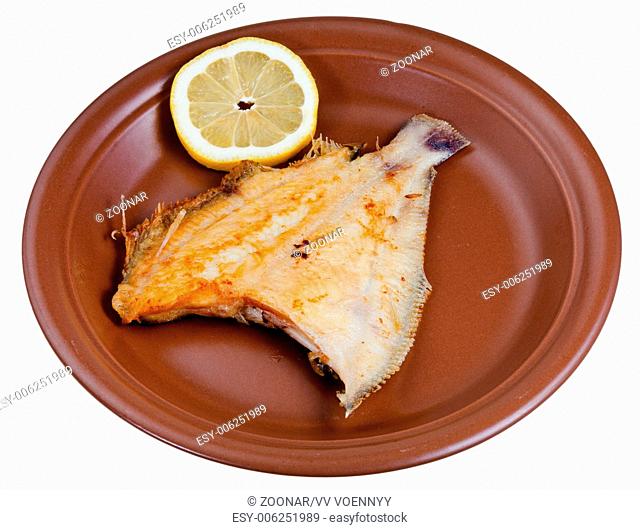 fried sole fish on brown plate