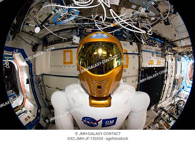 A fisheye lens attached to an electronic still camera was used to capture this image of Robonaut 2 humanoid robot during another system checkout in the Destiny...