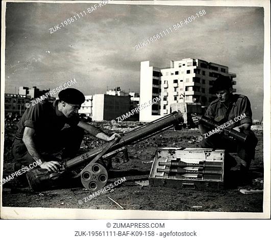 Nov. 11, 1956 - Latest scenes from Port said - Russian rocket launcher captured from Egyptians; Photo Shows PTE Kenneth Yoxall from Grewe and CPL Peter Absalom...