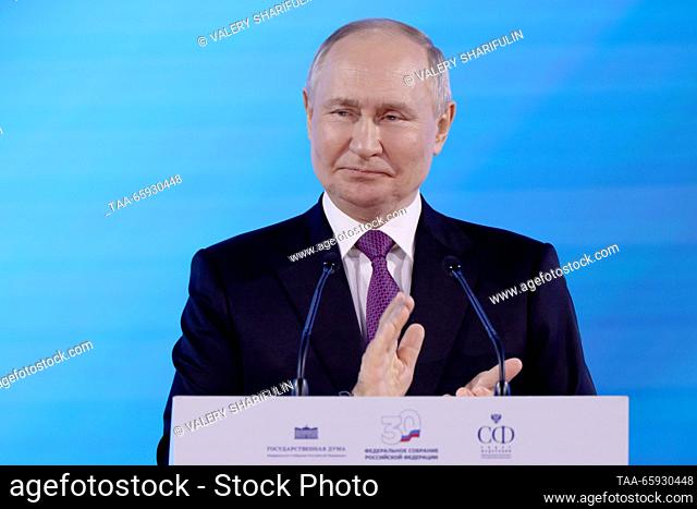 RUSSIA, MOSCOW - DECEMBER 20, 2023: Russia's President Vladimir Putin claps his hands during a meeting of the Council of Legislators of Russia dedicated to the...