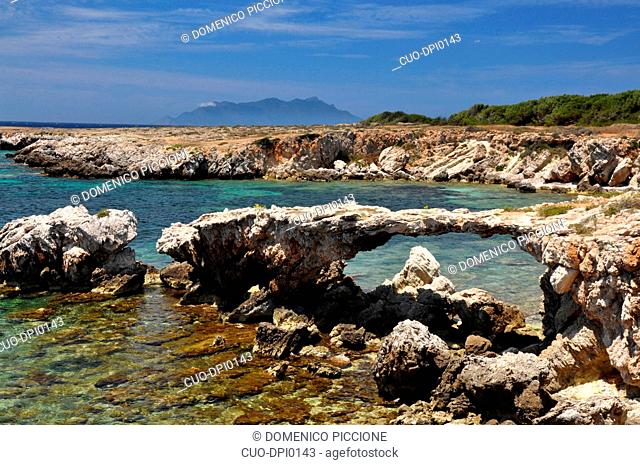 Favignana, Aegadian Islands, Egadi, Cala Rotonda, rocks coast, Marettimo island in the background, Sicily, Italy, Europe