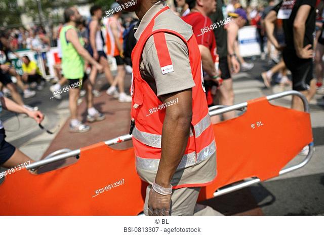 EMERGENCY AID WORKER Photo essay. Paris Marathon, April 2007. First aid attendants from the French Red Cross