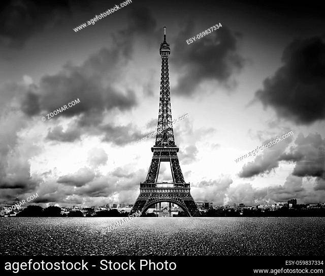 Artistic image of Effel Tower, Paris, France. Black and white, vintage mood with dramatic sky