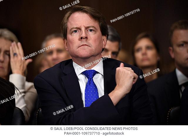 White House Counsel and Assistant to the President for U.S. President Donald Trump, Donald McGahn, listens to Supreme Court nominee Brett Kavanaugh as he...