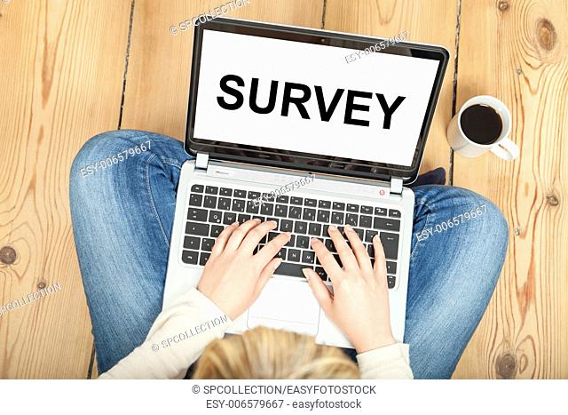 survey written on laptop for market research