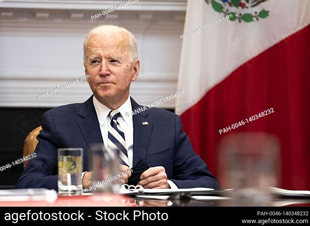 United States participates in a virtual bilateral meeting with President Andrés Manuel López Obrador of Mexico in the Roosevelt Room of the White House in...
