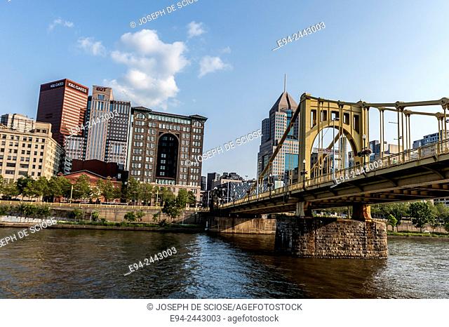 The Allegheny River with a partial view of Pittsburgh and a bridge in the background