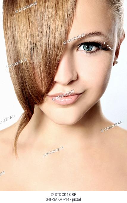 Young woman with false eyelashes