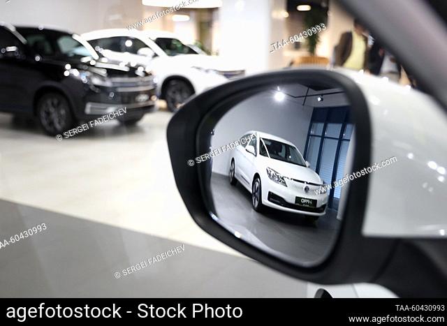 RUSSIA, MOSCOW - JULY 13, 2023: A rear-view mirror of an Evolute i-Sky electric crossover displayed in an ?? Voyah Moscow car dealership in Mytnaya Street