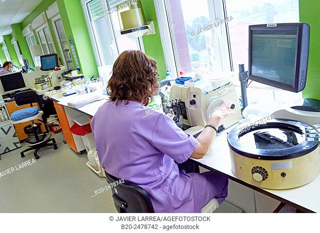 Technician using microtome, Histology, Anatomic Pathology, Hospital Donostia, San Sebastian, Basque Country, Spain