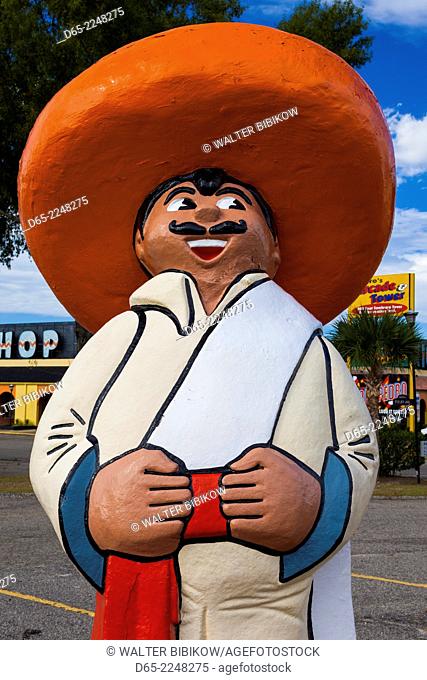 USA, South Carolina, South of the Border, signage for famous tourist attraction on Route 95, concrete Mexican statue