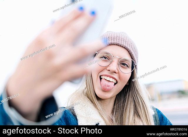 young woman, grimace, self portrait, selfie