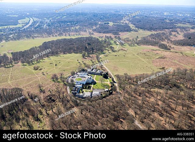 View over Richmond Park and White Lodge, a former hunting lodge and now the home of the Royal Ballet School, Richmond Park, London, UK. Aerial view