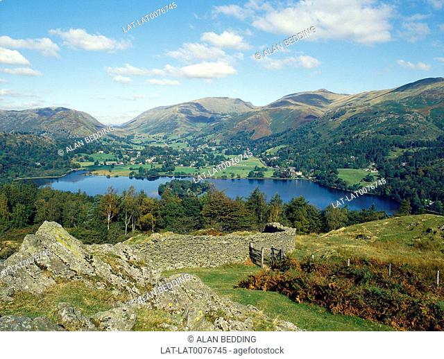 Grasmere lake. Village by shore. White houses. Home of William Wordsworth