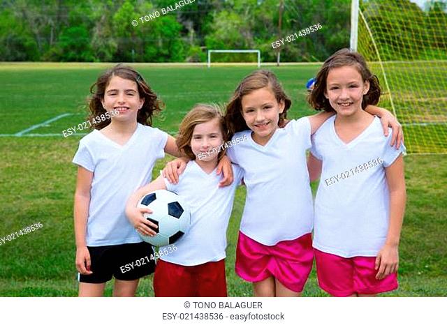 Soccer football kid girls team at sports fileld
