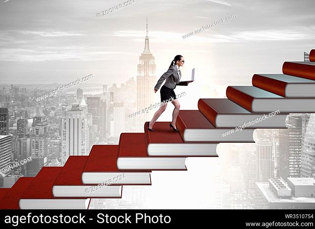 Businesswoman student climbing the ladder of education books