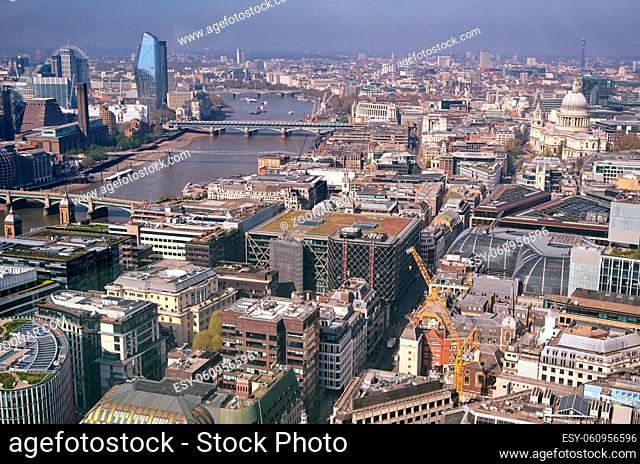 An aerial view of London, UK along the River Thames