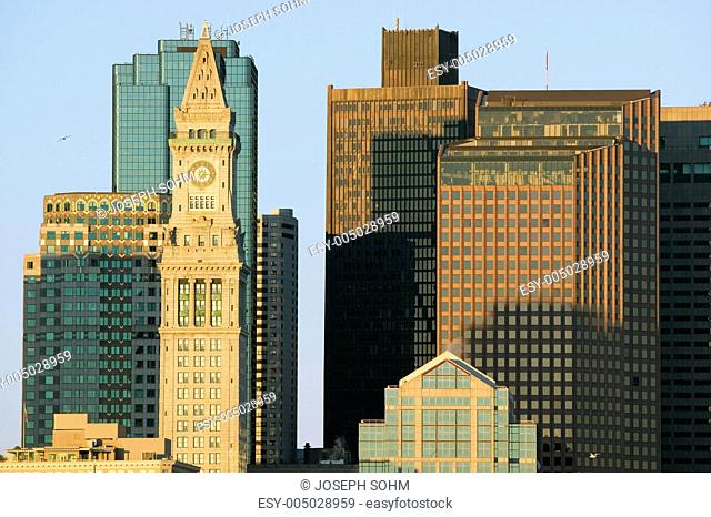 The Customs House Clock Tower and Boston skyline at sunrise, as seen from South Boston, Massachusetts, New England