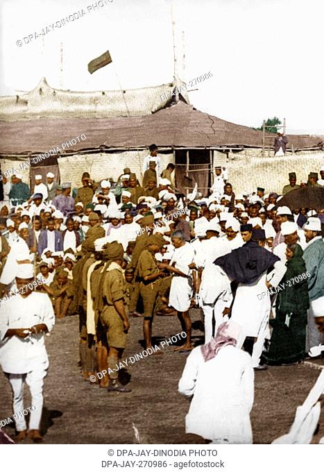 Mahatma Gandhi decorating Congress volunteers for their services, Karnataka, India, Asia, December 1924