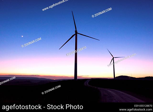 Wind farm silhouette at dusk