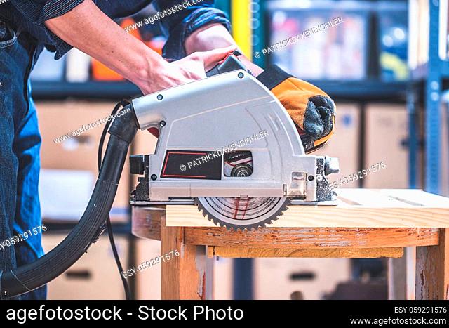 Close up of circular saw, ready for sawing wood planks