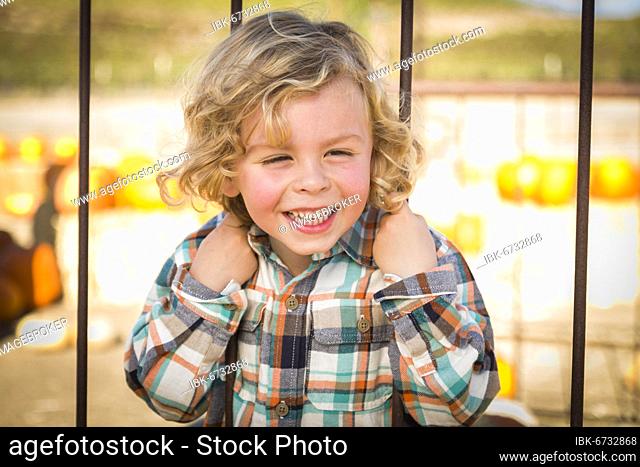 Adorable little boy playing at the park