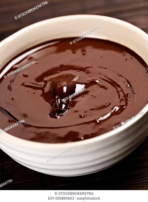 Bowl of soft melted rich dark chocolate