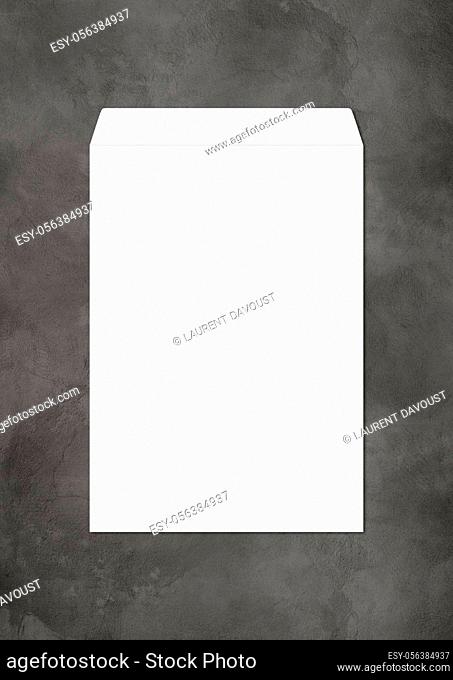 Large A4 white enveloppe mockup template isolated on dark concrete background