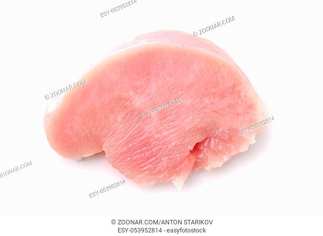 Top view of fresh turkey meat fillet slice isolated on white
