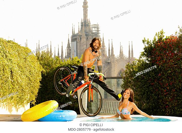 The bike trial champion Vittorio Brumotti and the showgirl Giorgia Palmas, the presenters of the TV show Paperissima, posing outside the DownTown gym on piazza...