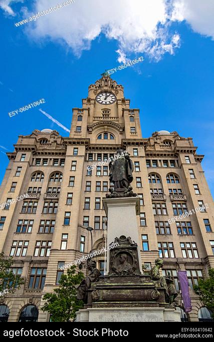 LIVERPOOL, UK - JULY 14 : The Royal Liver building with a clock tower in Liverpool, England on July 14, 2021