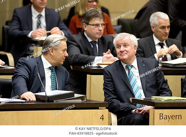 Premier of Bavaria Horst Seehofer (CSU) talks to the Governing Mayor of Berlin Klaus Wowereit (L) at the Federal Council of Germany in Berli, Germany