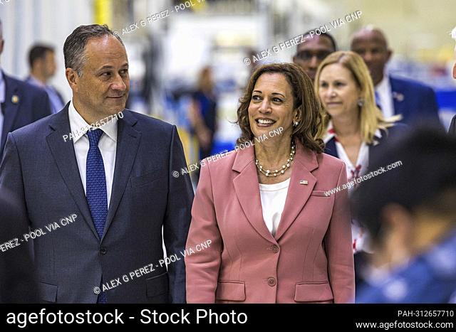 Second gentleman Douglas Emhoff and United States Vice President Kamala Harris walk during a tour of Artemis II and III hardware after arriving to view NASA’s...
