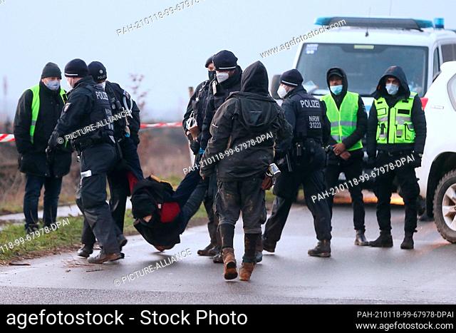 18 January 2021, North Rhine-Westphalia, Erkelenz: The police blocked the activists' way to the demolition site. Several activists were able to break through...