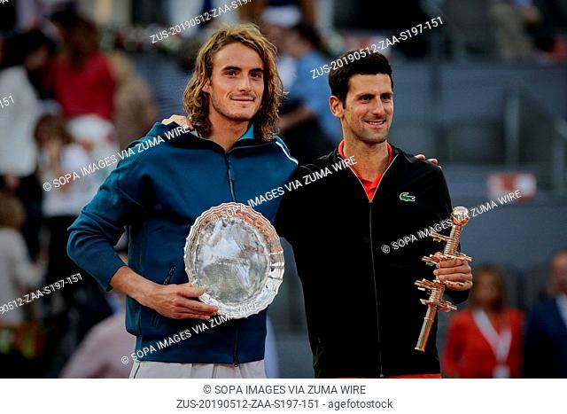 May 12, 2019 - Madrid, Madrid, Spain - Stefanos Tsitsipas from Greece and Novak Djokovic from Serbia are seen after the Mutua Madrid Open Masters final match on...