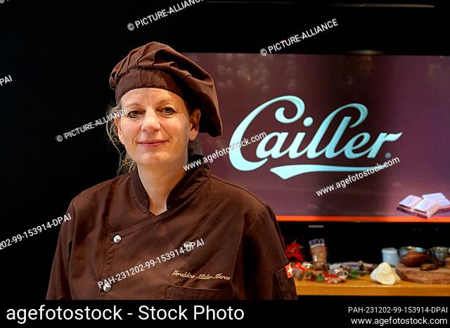 PRODUCTION - 13 November 2023, Switzerland, Broc: Award-winning chocolatier Géraldine Müller Maras from the oldest surviving Swiss chocolate manufacturer...