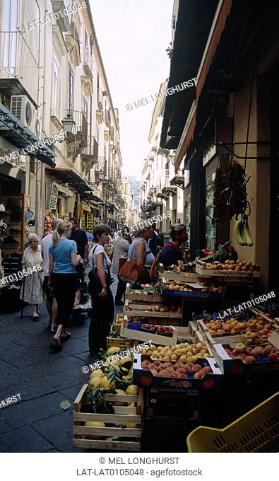 Amalfi coast. Narrow street in town. Market. Stalls. Fruit and vegetables