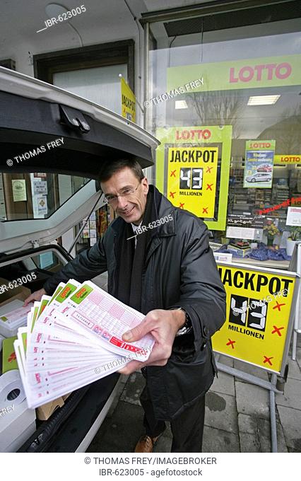 Toni Schweizer, head of general agency from Lotto Rheinland-Pfalz, deliver more lottery tickets to the receiving offices