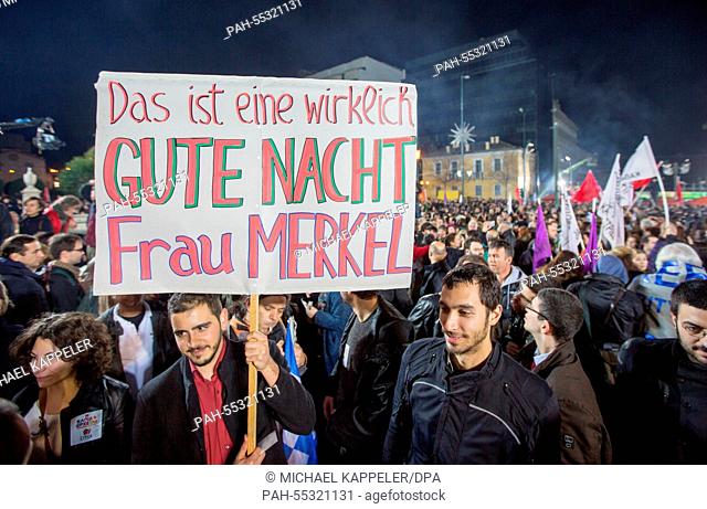 A Poster with the Slogan ""Good Night Ms. Merkel"" (Das ist eine wirklich GUTE NACHT Frau Merkel) is seen durning Alexis Tsipras leader of the radical left main...