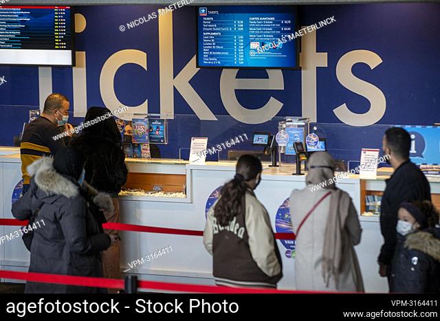 Illustration picture shows people queuing at the register of a Kinepolis cinema complex in Brussels, Saturday 01 January 2022