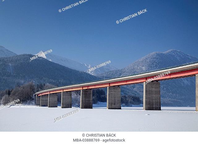 Bridge over Sylvenstein Dam in front of Karwendel mountains, Fall village near Lenggries, Upper Bavaria, Bavaria, Germany