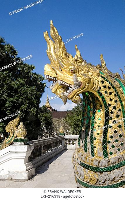 Golden dragon heads in front of the temple Ho Phra Bang, Luang Prabang, Laos