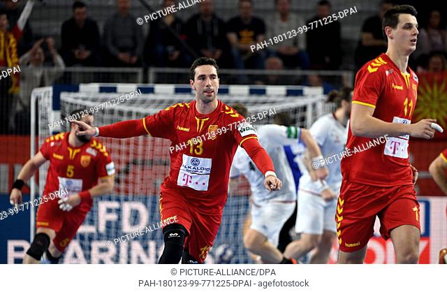 Macedonia's Filip Mirkulovski (C) celebrating after scoring a goal during the European Men's Handball Championship match between Macedonia and the Czech...