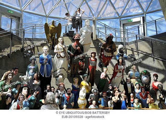Display of figureheads in the new Cutty Sark exhibition space