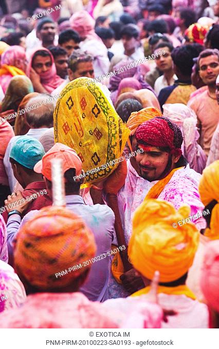 People celebrating Holi festival, Barsana, Uttar Pradesh, India