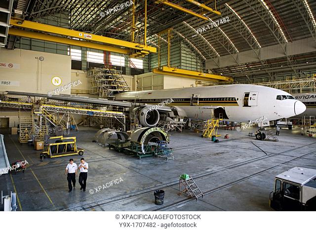 An airplane in a maintenance aviation facility at the SIA Engineering Company in Singapore   SIA Engineering Company Limited is a major provider of aircraft...